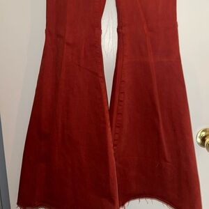 Deep rust orange flare jeans
